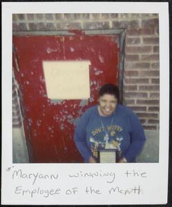 Maryann winning the employee of the month