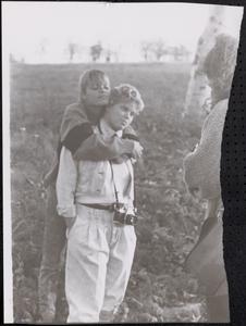 Two young women hugging