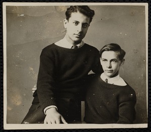 Two young men in sweaters posing