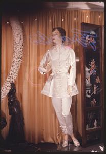 Mannequin in shop window wearing Tang suit