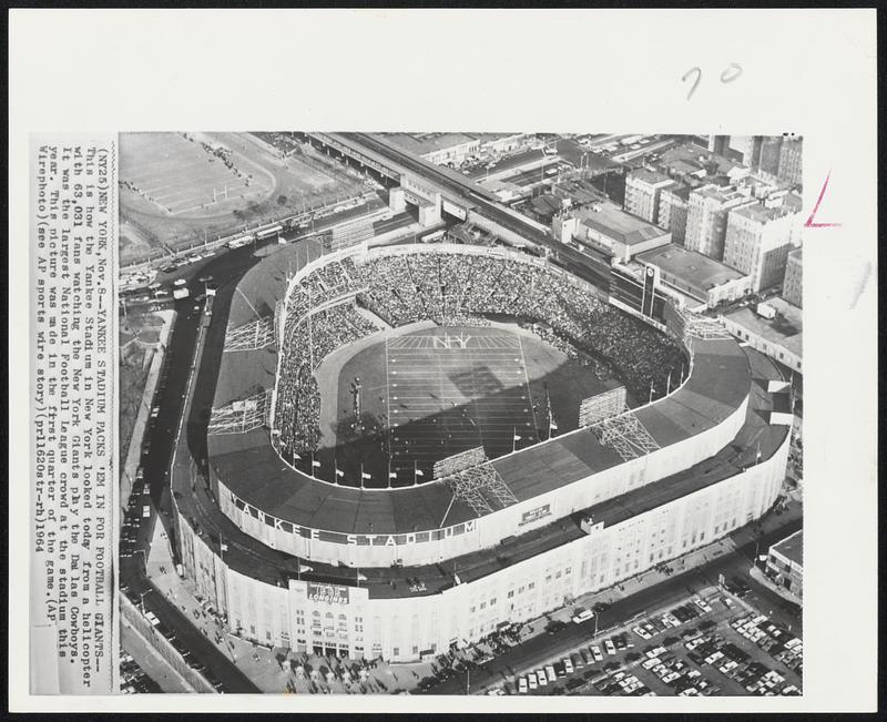 Yankee Stadium Packs ‘Em in for Football Giants--This is how the Yankee Stadium in New York looked today from a helicopter with 63,031 fans watching the New York Giants play the Dallas Cowboys. The was the largest National Football League crowd at the stadium this year. This picture was made in the first quarter of the game.