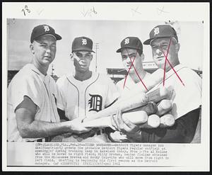 Tiger Woodsmen -- Detroit Tigers manager Bob Sheffing (right) greets the probable Detroit Tigers regular outfield at opening of spring training in Lakeland today. From left: Al Kaline who will be moved to right field; Billy Bruton, center fielder obtained from the Milwaukee Braves and Rocky Colavito who will move from right to left field. Sheffing is beginning his first season as the Detroit manager.