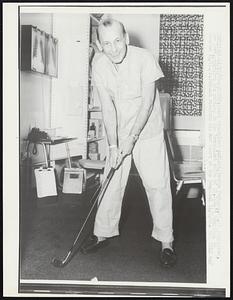 Heart transplant patient, Andrew Perhacs, 55, of Hempstead, New York, practices his putting in the transplant suite of St. Luke's hospital in Houston 11/15. Mr. Perhacs received his new heart at the hospital 11/8/68.