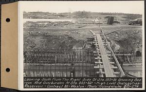 Contract No. 80, High Level Distribution Reservoir, Weston, looking south from the right side of Sta. 885+80 showing bedrock and overburden at Sta. 885+80+/-, high level distribution reservoir, Weston, Mass., Apr. 16, 1940