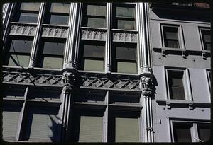 Gargoyles carved onto the side of a building