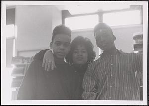 Kyrk and Desi posing with a woman