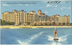 Riding the surf at Hollywood Beach, Florida