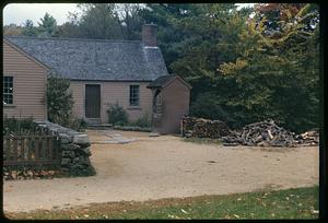Woodpiles in front of house, Old Sturbridge Village, Sturbridge, Massachusetts