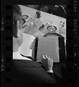 Ted Kennedy prepares to make speech, reading text, Boston