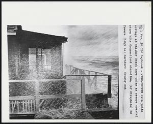 Old Saybrook - Wind-Driven rain pelts cottage at Chalker Beach here today as severe coastal storm hits Connecticut shoreline. Ed Powers. Hartford County out.
