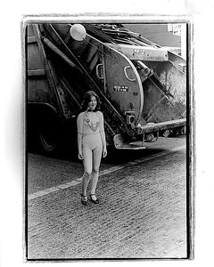 Girl and garbage truck