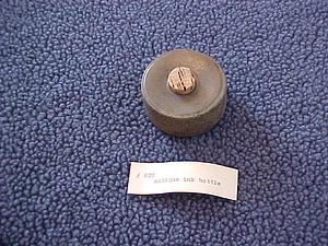 Round ink bottle with cork