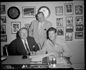 Ted Williams signing at Fenway park with Joe Cronin / Mike Higgins