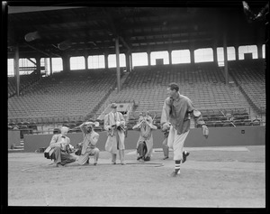 Ted Williams warms up in front of photographers