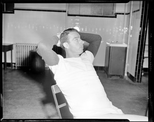 Joe DiMaggio relaxes in locker room at Fenway Park