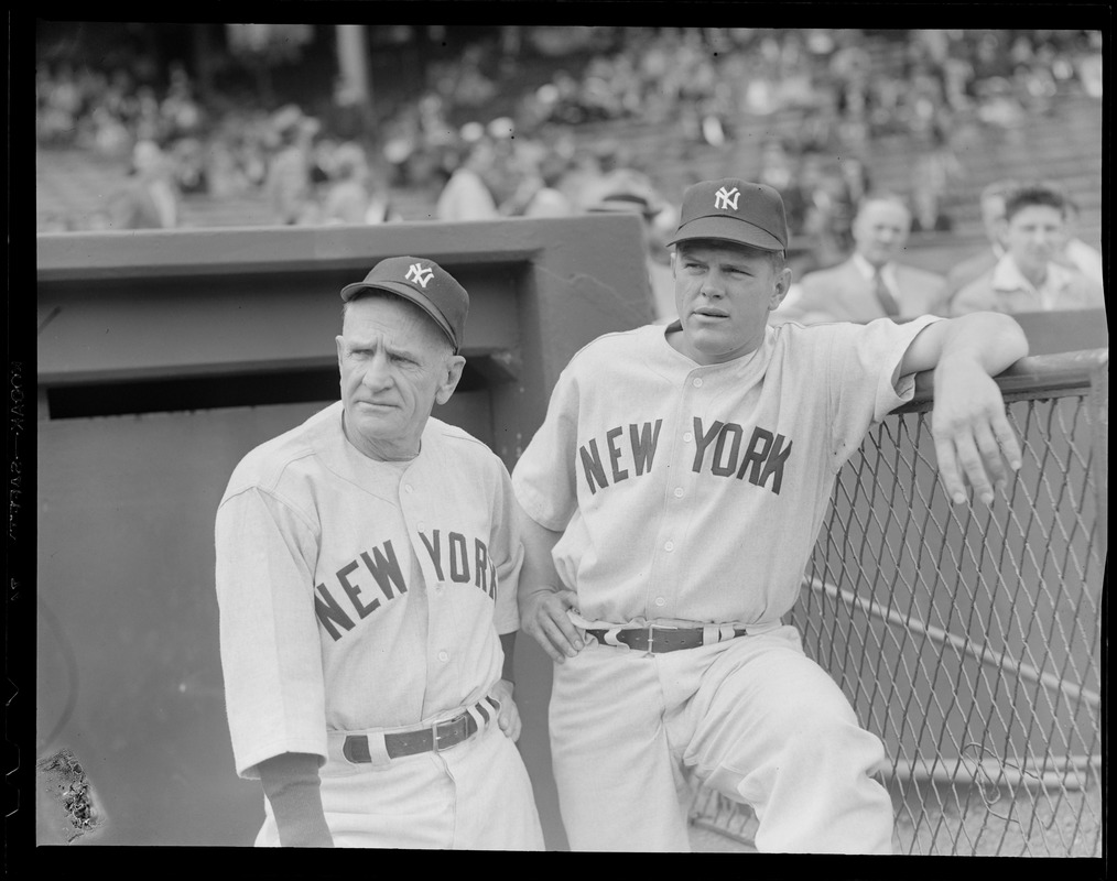 N.Y. Yankees, manager Casey Stengel with one of his players