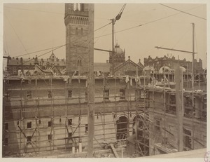 North Courtyard wall with bricklayers and scaffolds, construction of the McKim Building