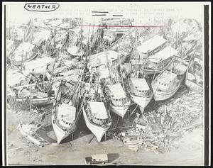 Shrimp boats lay around in Aransas Pass 8/4 after the high winds and water of Hurricane Celia struck Aransas Pass.