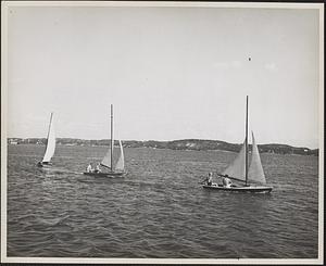Leathernecks of the NOB, Marine Detachment, Bermuda, are shown here sail boating in Middle Sound, Georges Bay