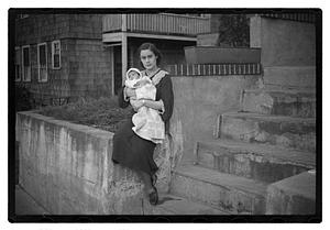 Mercedes Pasarell Sanromá holding a baby
