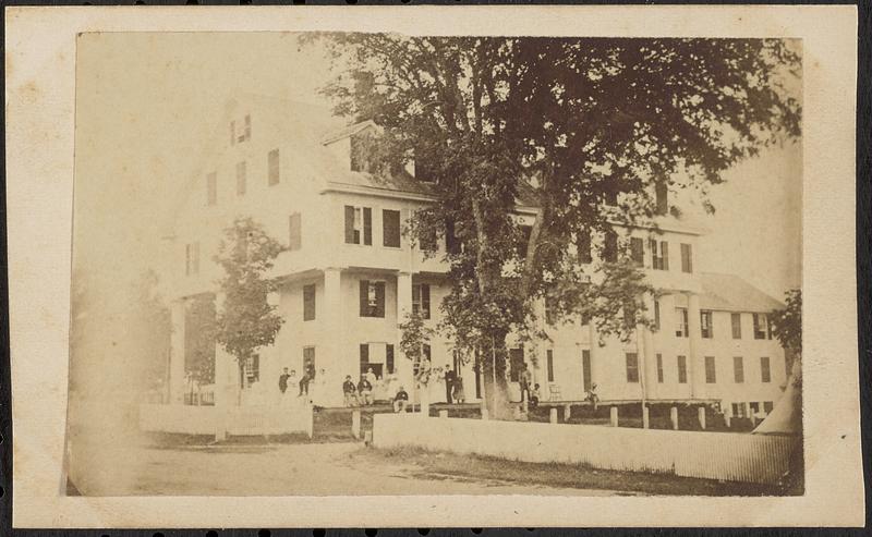 Large building with a group of people