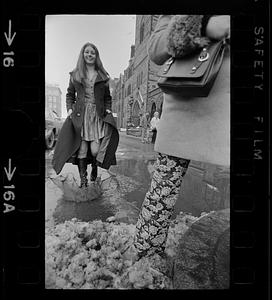 Maxi coat and winter slush in Copley Square, Boston