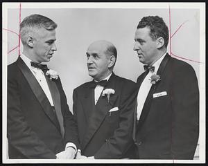 Contractors in Christmas Party--The annual banquet of the Associated General Contractors of Massachusetts was held last night in the Hotel Statler. Left to right, Joel B. Leighton, executive secretary; Julius Abrams, association president, and Alan Cunliffe, chairman of committee.