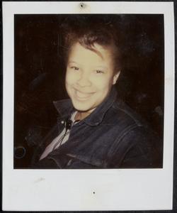 Young woman with headphones smiling