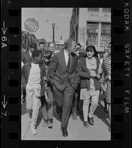 Mayor White walking with young students during the BRA sit-in
