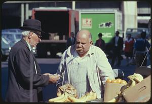 Produce stand in market on Hanover Street, Boston