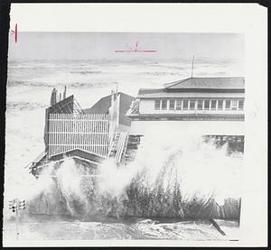 Spray is Thrown high in the air as waves batter Galveston, Tex., seawall. High tides from Hurricane Carla lashed seawall and pleasure pier. Winds of severe intensity also resulted from Carla's passage, and extremely heavy rain also was expected--up to 15 inches possibly.