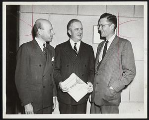 Industrialists and Impetus to Waltham’s Red Feather Campaign–Left to right: Charles Francis Adams, Jr., Raytheon Manufacturing Company; Michael T. Kelleher, former president Boston Chamber of Commerce, the chief speaker, and Paul P. Johnson, Waltham Watch Company. Meeting was kick-off dinner inaugurating campaign last night.