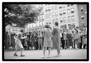 Two young women competing, Boston Common