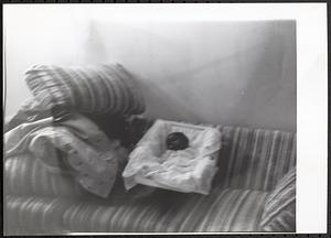 Baby sleeping on a couch