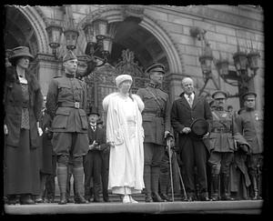 Mayor Peters and wife stand on Boston Public Library steps with the King, Queen and Prince of Belgium