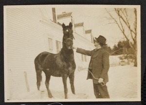 Portrait of man with horse