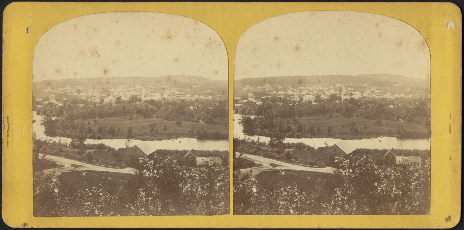 River with small town beyond