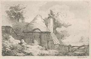 A thatch roof farmhouse