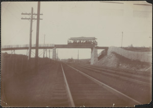 Trolley car, Newburyport to Boston, on trestle over railroad, 1910