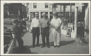 Men outside Dave Harnch's antique shop, Liberty and State Sts.
