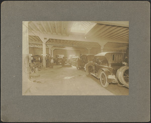 Corner of Prospect and State St., interior of garage, 1920