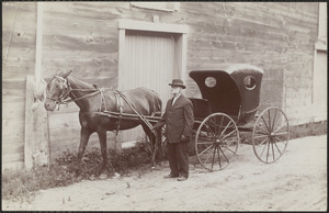 J.E. Colman at Colman's Lumber Wharf, horse and carriage