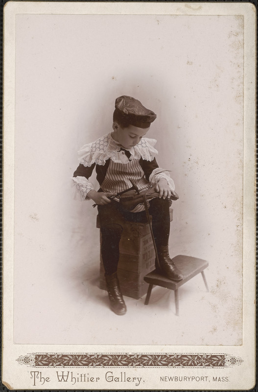 Young lad dressed in a highly decorative outfit