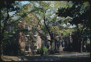 Tufts College hall through trees