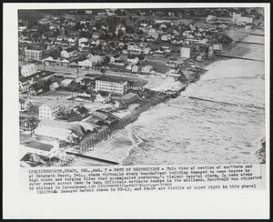 Path of Destruction - This view of section of northern end of Rehoboth Beach, Del., shows virtually every beach-front building damaged to some degree by high winds and surging tides that accompanied yesterday's violent coastal storm. In some areas water swept across town to bay. Officials estimate damage in the millions. Boardwalk was supported by pilings in foreground.