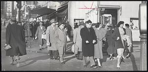 Walkers In The Sun - Yesterday's foretaste of spring packed downtown Boston with shoppers like this line of marchers at Tremont street.