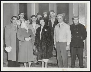 Voting on Cotton-Rayon Strike in New Bedford yesterday were these members of the Textile Workers Union of America, CIO, at the Sharpshooters Club. The New Bedford workers broke precedent by demanding a secret ballot in their strike vote.