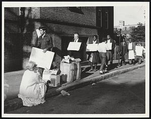 Pickets at Gibson School one tired picket rests in foreground
