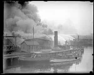 Boston and Maine Freight sheds fire. Four alarm - North Station