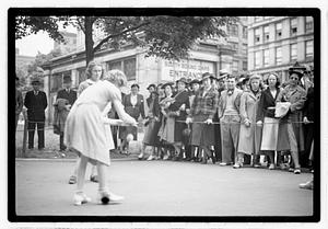 Two young women competing, Boston Common